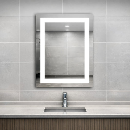 Bathroom with an Align lighted mirror above a sink against a tiled wall.