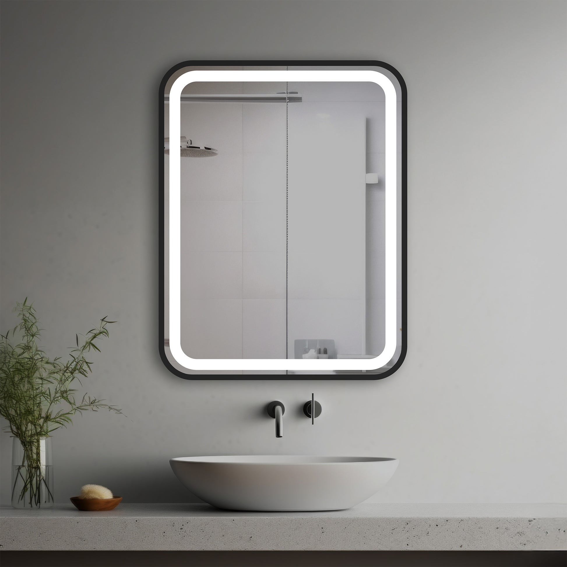 Riley Lighted Mirrorin a modern bathroom over a vessel sink