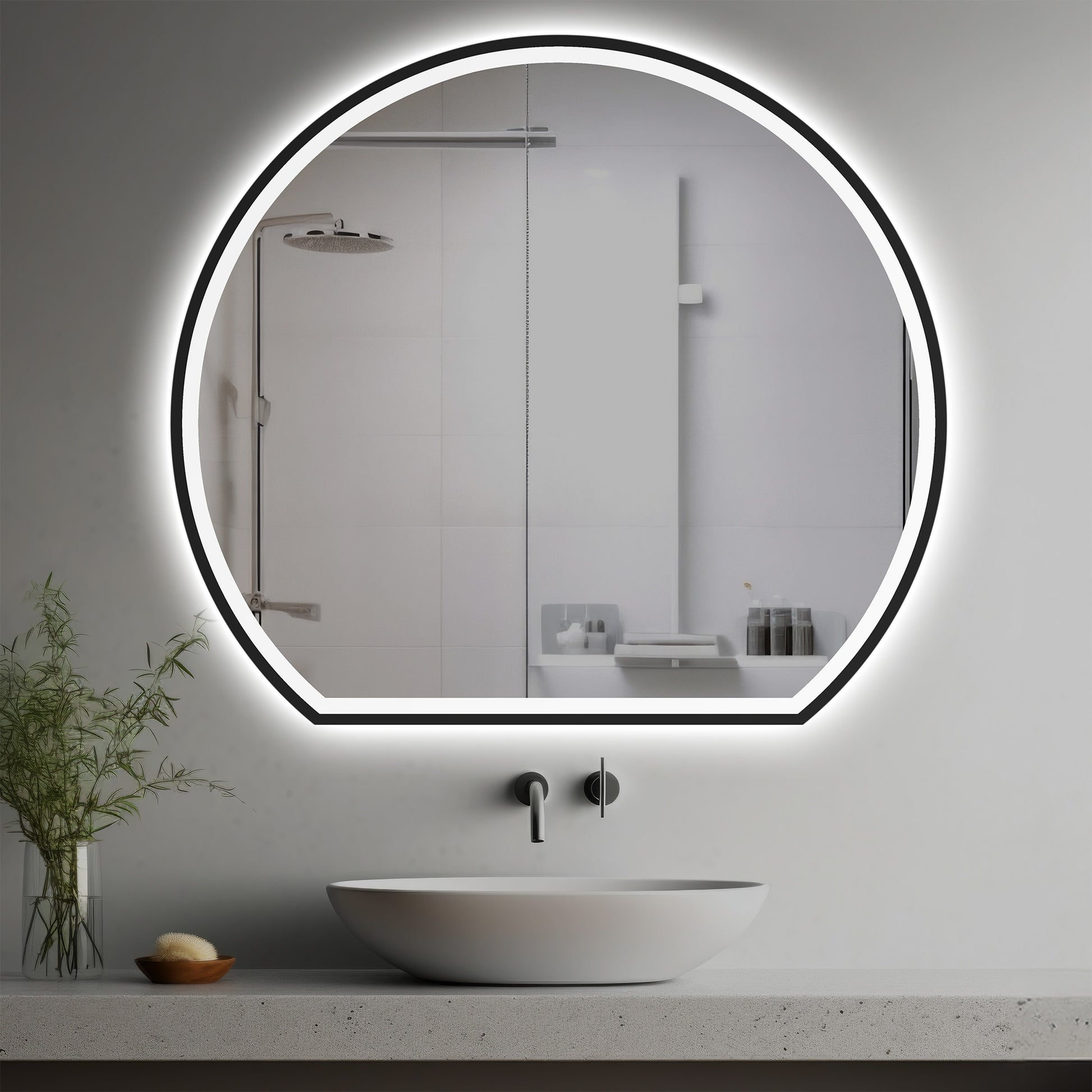 Escher Lighted Mirror in a modern bathroom over a vessel sink