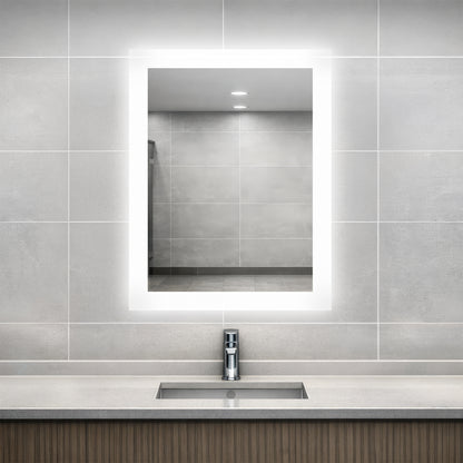 Bathroom vanity with Facet lighted mirror and sink.