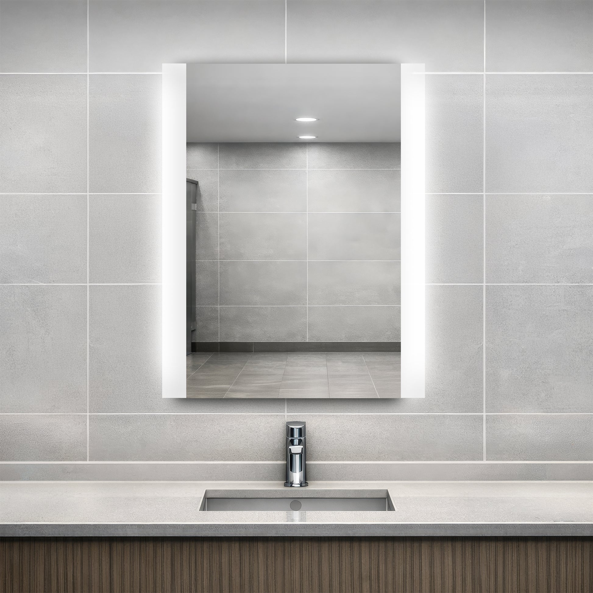 Veil Lighted mirror in bathroom with a sink, and tiled walls