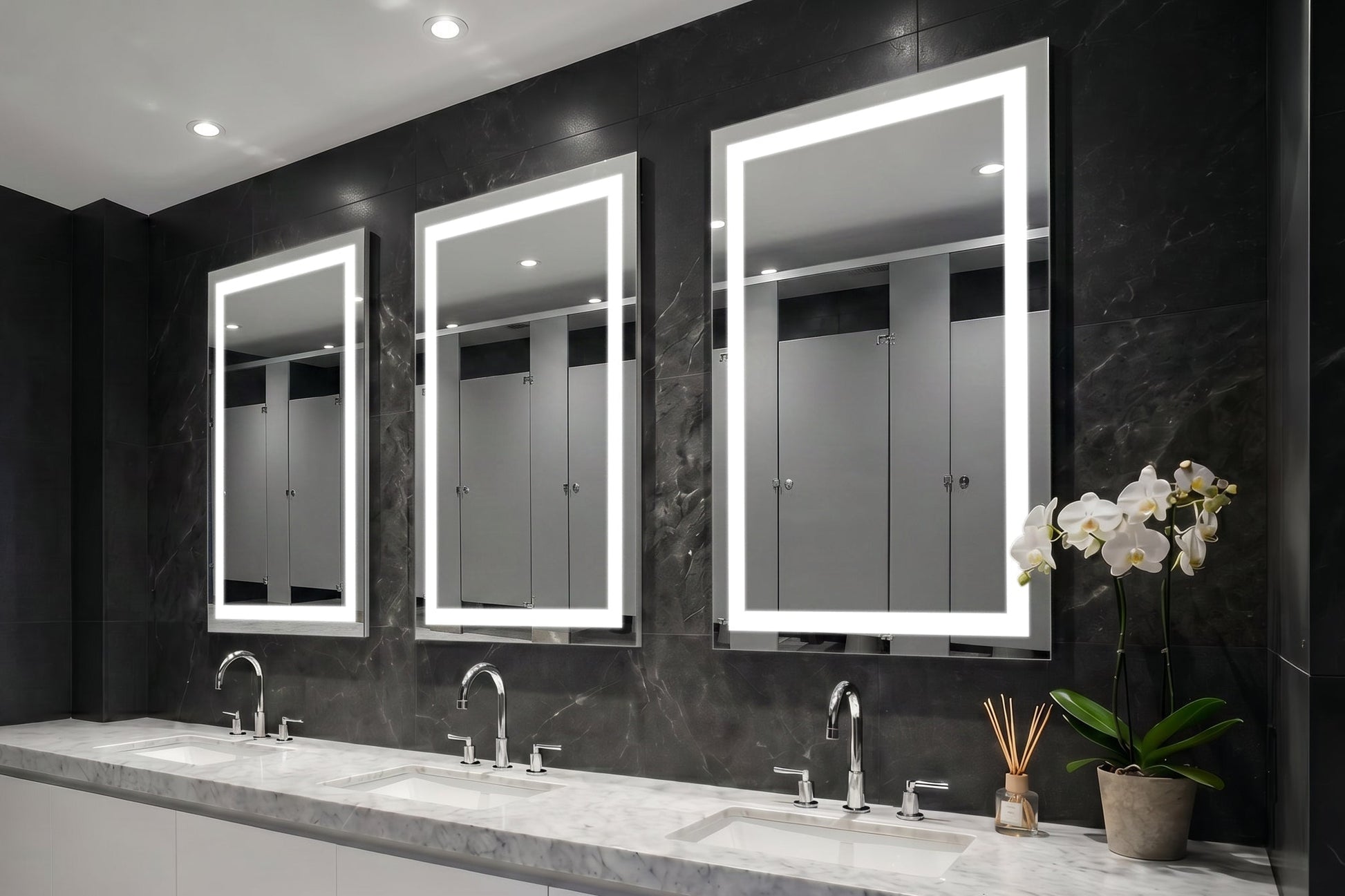 Bathroom with three Align lighted mirrors above a vanity.
